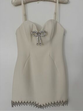 AREA Ivory Mini Dress with Crystal Bow and Spike Hem